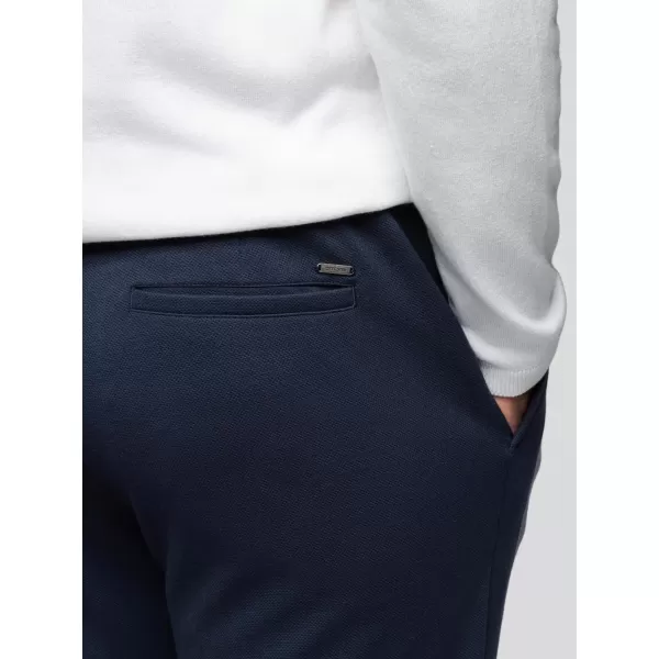  Pánské kalhoty OMBRE OM-PACP-0283 NAVY BLUE 