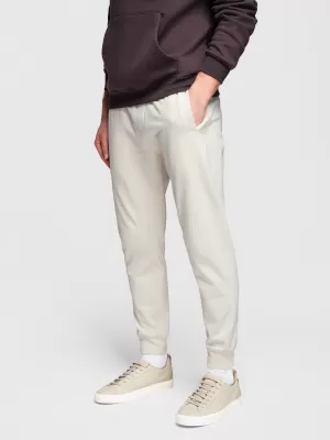 Pánské tepláky OMBRE OM-PABS-0305 CREAM