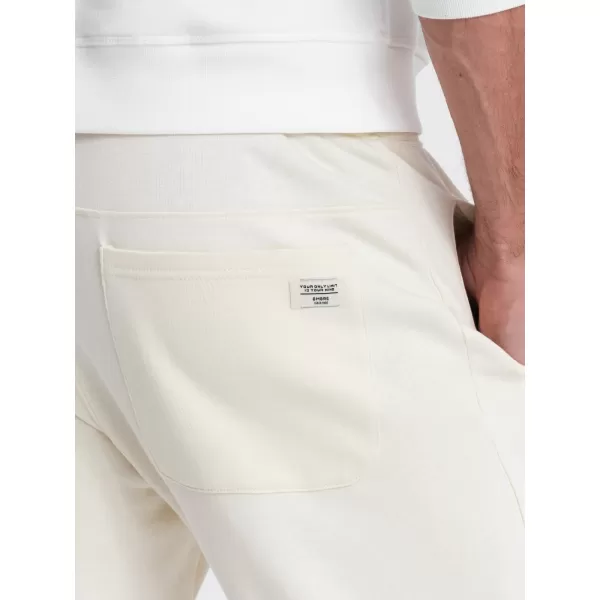  Pánské tepláky OMBRE OM-PABS-0173 CREAM 