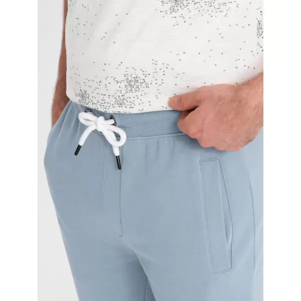  Pánské tepláky OMBRE OM-PABS-0206 LIGHT BLUE 