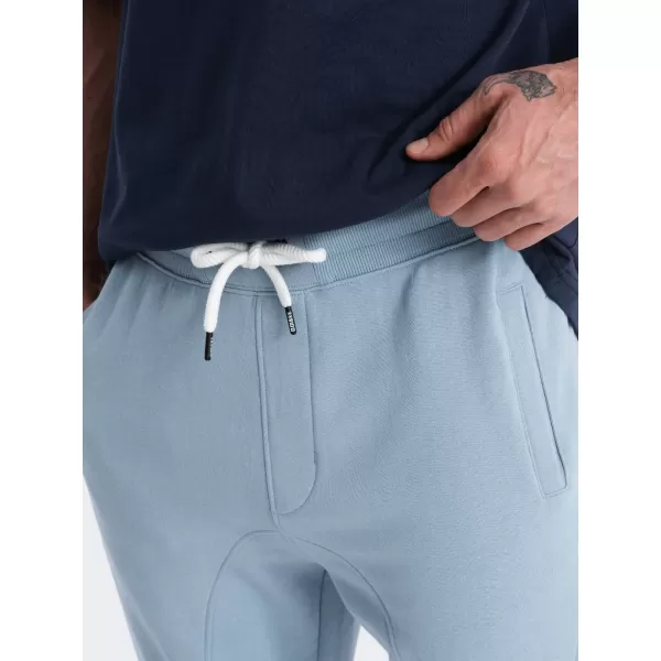  Pánské tepláky OMBRE OM-PABS-0173 BLUE 
