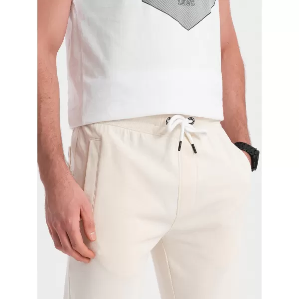  Pánské tepláky OMBRE OM-PABS-0206 CREAM 