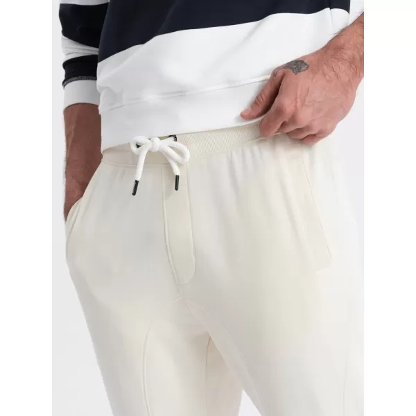  Pánské tepláky OMBRE OM-PABS-0173 CREAM 