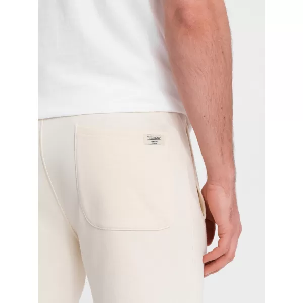  Pánské tepláky OMBRE OM-PABS-0206 CREAM 