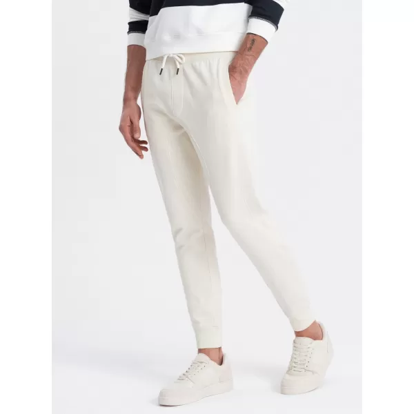  Pánské tepláky OMBRE OM-PABS-0173 CREAM 